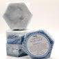 Hexagonal soap bar with 'Midnight Waters' label on a white background