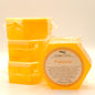 Yellow hexagonal soap bars with 'Peaches' label on a white background