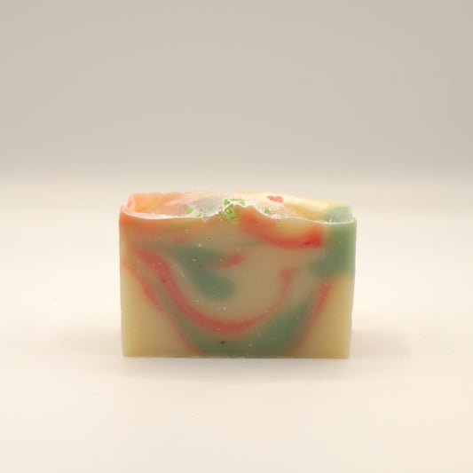 Colorful swirled soap bar on a light background