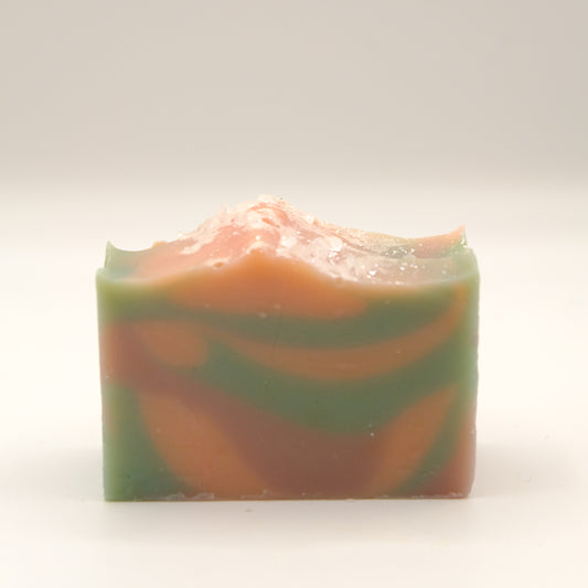 Colorful swirled soap bar on a white background