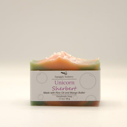 Bar of soap labeled 'Unicorn Sherbert' on a light background