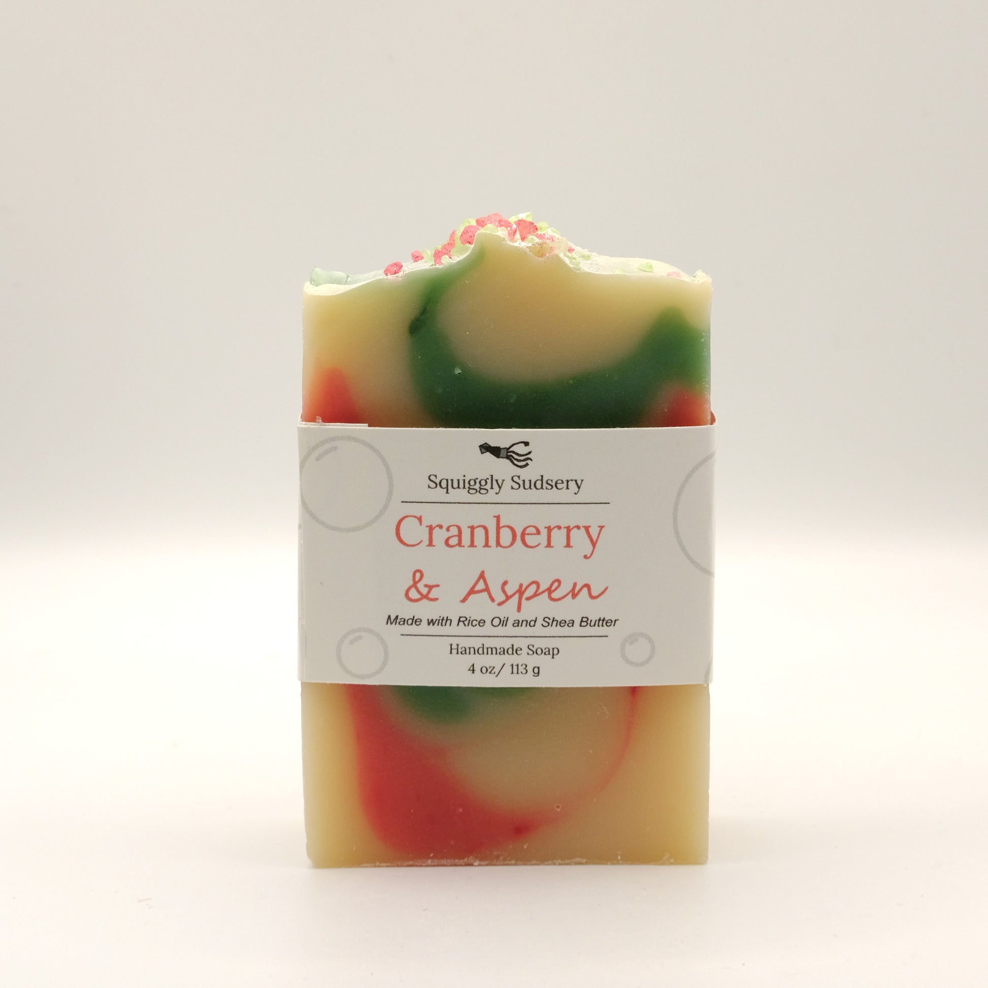Colorful soap bar with a label on a white background