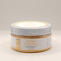 Jar of Papaya Paradise foaming sugar scrub on a beige background