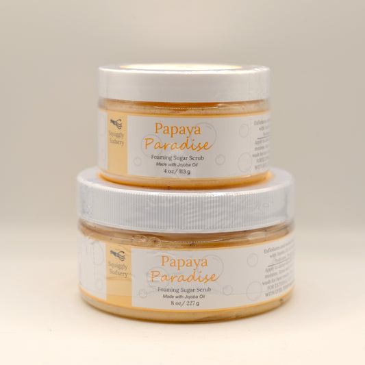 Two jars of Papaya Paradise foaming sugar scrub on a light background