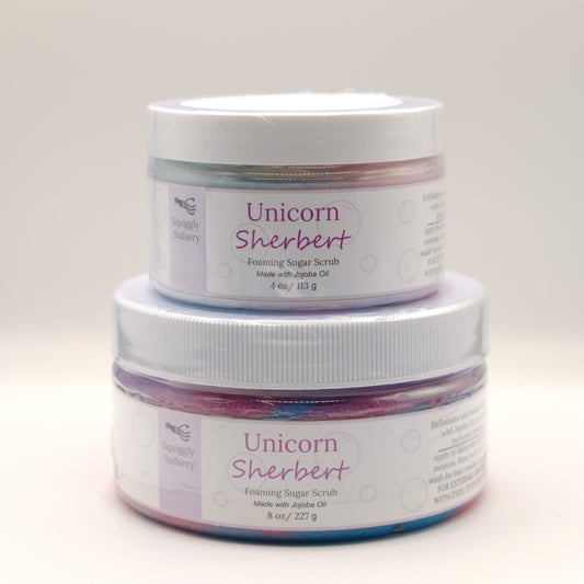 Two jars of Unicorn Sherbert foaming sugar scrub on a white background
