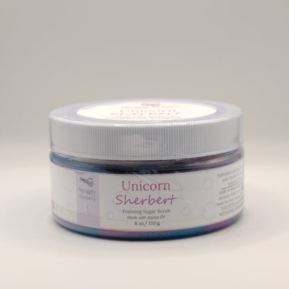 Jar of Unicorn Sherbert foaming sugar scrub on a light gray background