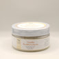 One jar of Vanilla Buttercream body scrub on a light background