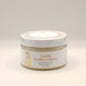 Jar of Vanilla Buttercream foaming sugar scrub on a light gray background
