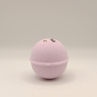 Purple bath bomb on a beige background
