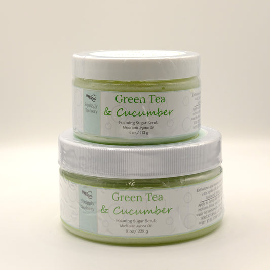 Two jars of Green Tea & Cucumber foaming sugar scrub on a light background