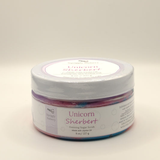Eight-ounce jar of Unicorn Sherbert foaming sugar scrub on a light background