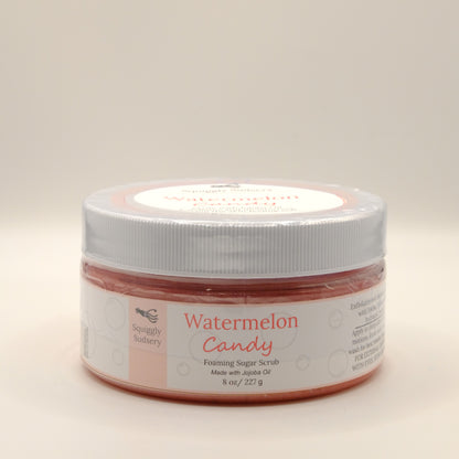 Eight-ounce jar of watermelon candy foaming sugar scrub on a white background.
