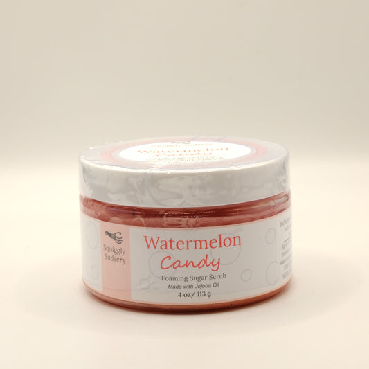 Four-ounce jar of watermelon candy foaming sugar scrub on a white background