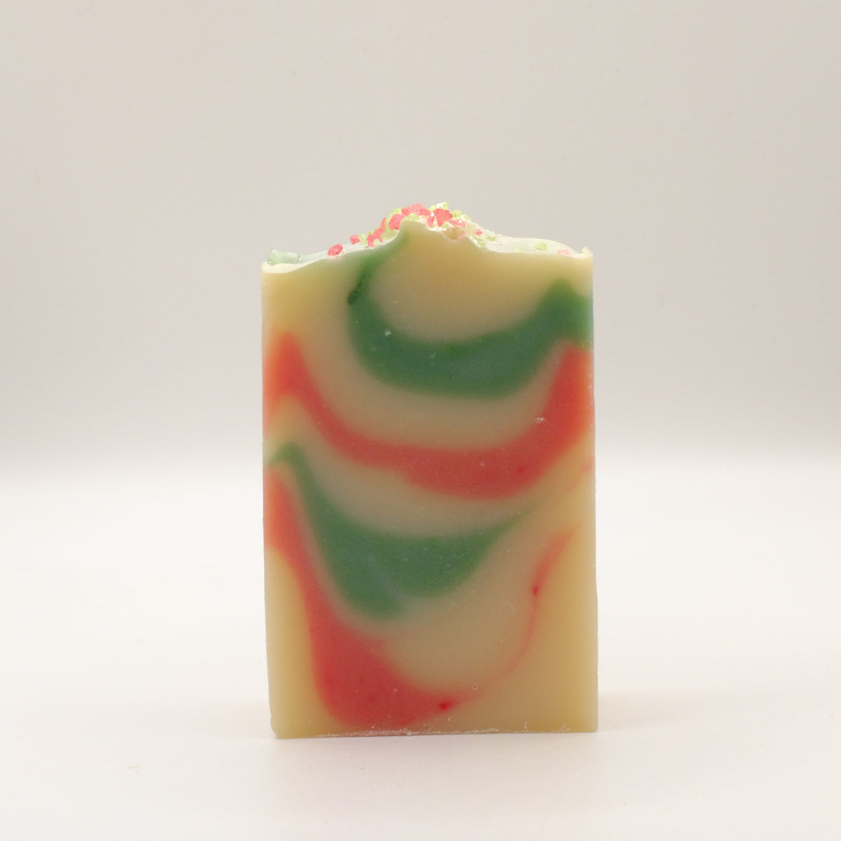 Colorful swirled soap bar on a white background