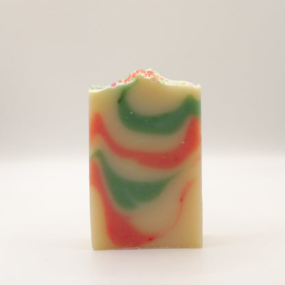Colorful swirled soap bar on a white background