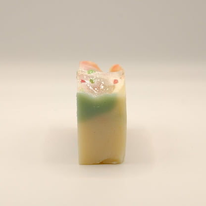 Colorful soap bar with a textured surface on a light background