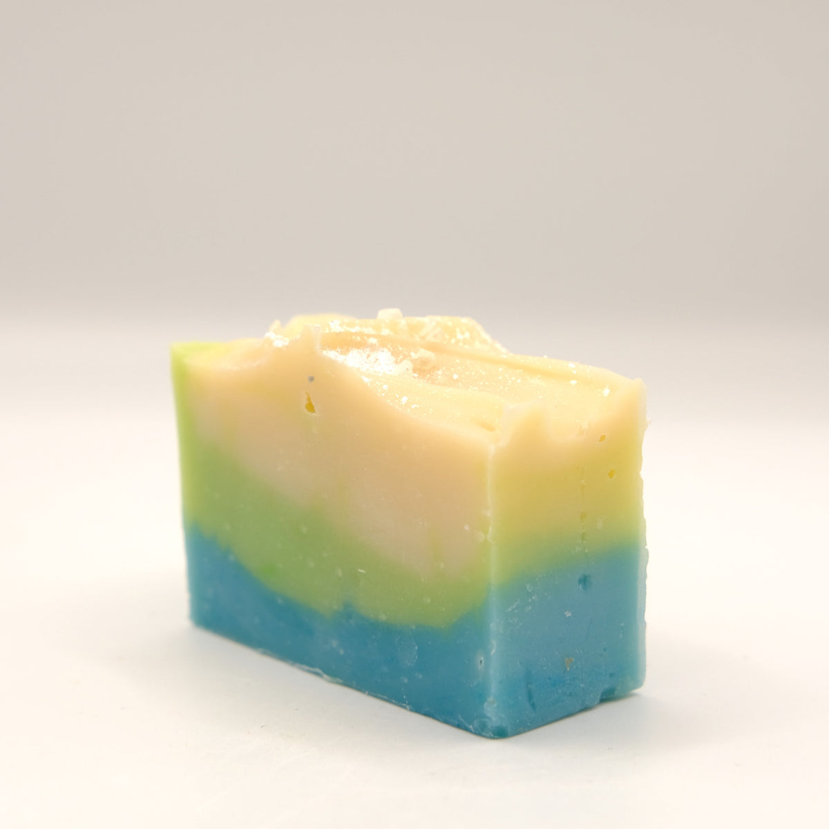 Multicolored soap bar on a white background