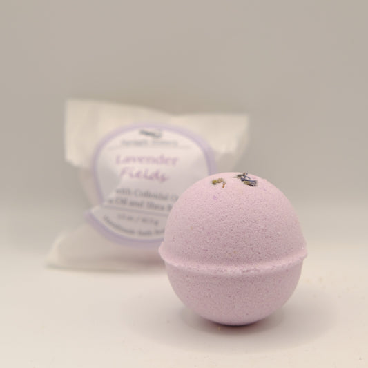 Bath bomb and packaging on a light gray background