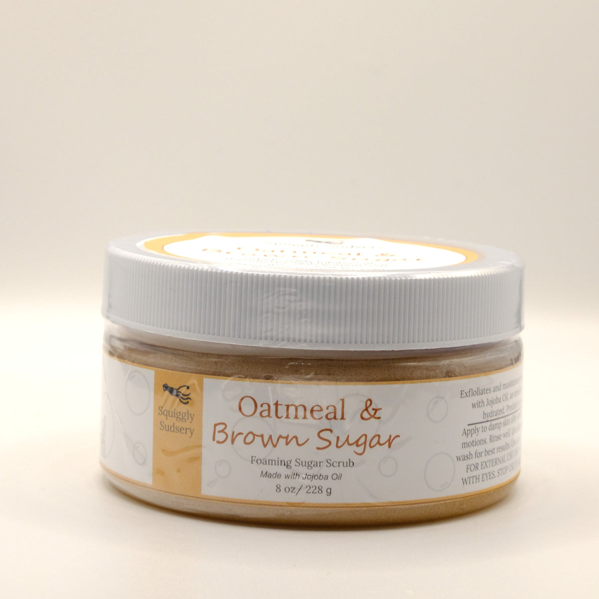 Eight-ounce jar of Oatmeal & Brown Sugar scrub on a light background