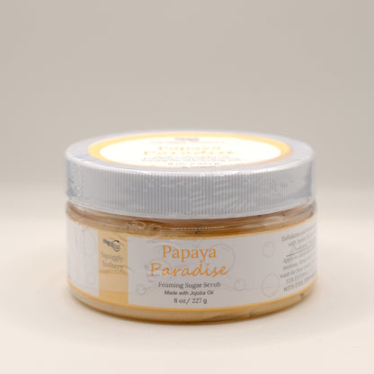 Jar of Papaya Paradise foaming sugar scrub on a beige background