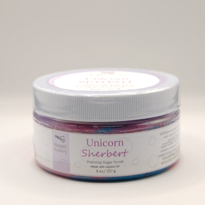 Jar of Unicorn Sherbert foaming sugar scrub with a white lid on a light gray background