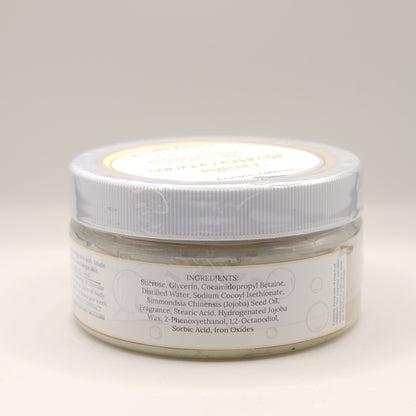 One jar of Vanilla Buttercream body scrub on a light background