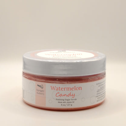 Eight-ounce jar of watermelon candy foaming sugar scrub on a white background.